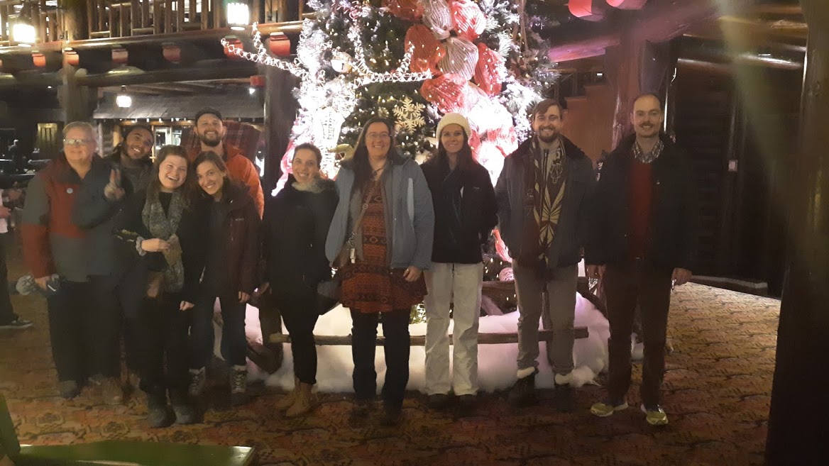 Students pose in front of Christmas decorations in Montreal, Canada